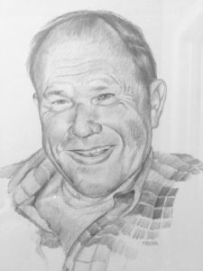 A pencil sketch of a man smiling, reminiscent of a Meissner oil painting. He has short hair and is wearing a plaid patterned shirt. The drawing is detailed, capturing his facial features and expression with remarkable precision.