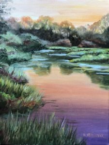 A serene landscape painting depicts Kiokee Creek, a reflective river bordered by lush greenery. The sky is painted in soft pastel hues, suggesting either sunrise or sunset, casting a warm glow on the scene.