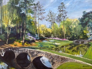 A serene landscape painting reminiscent of Augusta National features a stone bridge arching over a reflective waterway, surrounded by lush greenery and tall trees. Vibrant flowers bloom along the waters edge under a clear blue sky, evoking the tranquility of Hole No. 12 on a golf course.