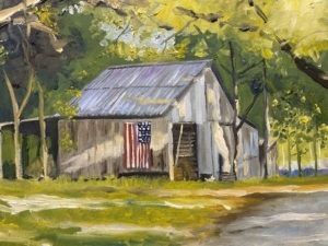 A rustic barn with a tin roof stands amidst trees, bathed in sunlight. An American flag is draped on the side of the barn. This scene, reminiscent of Dorn Mills charm, is painted in warm, natural colors, conveying a peaceful rural setting.