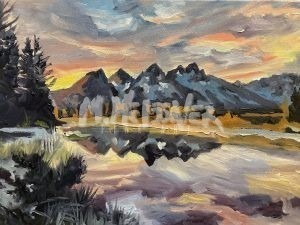 Teton Reflection depicts a tranquil sunset over the Teton mountains mirrored in serene waters, with trees framing the foreground and vibrant hues of orange, purple, and blue painting the sky.