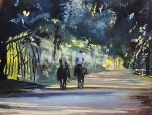 Two people ride horses on a sunlit path near the Aiken Train Depot and Museum, where sunlight filters through tall trees, casting dappled shadows as they approach a brighter clearing.