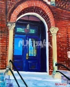 A vibrant Ocean Sunrise painting depicts a blue door in a red brick building, framed by stone columns and lit by a hanging lamp. Sunlight casts gentle shadows on the steps leading up to it, reminiscent of ocean hues at sunrise.