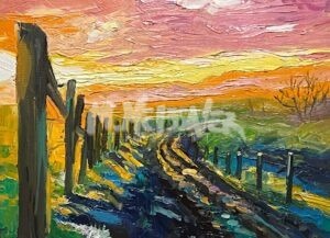 Pallet knife landscape features a vibrant impressionist rural scene at sunset. A curving path, lined by a wooden fence, winds through as the sky radiates pink, orange, and yellow hues. The ground is speckled with green and blue tones.