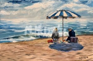 Two people sit under a blue and white striped beach umbrella on the sand, facing the ocean waves. The scene is painted in an impressionist style, with cloudy skies above and picnic items nearby.