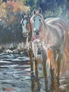 Two horses stand side by side in a shallow stream, surrounded by foliage. Broad brushstrokes and warm tones reflect the serenity near No. 9 par 3 course Augusta, capturing light on water and evoking tranquil greens.