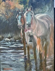 Two horses stand in a stream amid lush foliage, their reflections captured with expressive brushstrokes and warm colors, evoking the tranquility of No. 9 par 3 course Augusta.