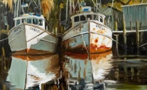 Two fishing boats with weathered hulls are docked side by side, reflected in calm water. Trees and a wooden building add to the rustic, peaceful scene, reminiscent of paintings by Michael Meissner.