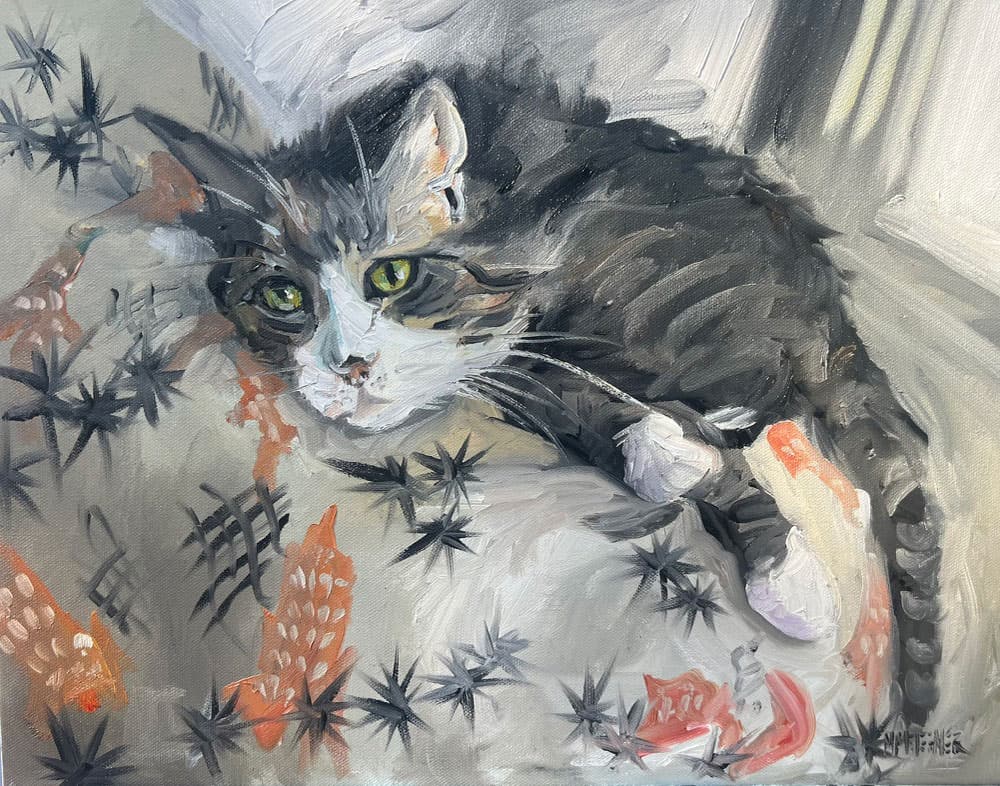 A painting of a gray and white cat with green eyes lying on a patterned, light-colored blanket. The cat looks relaxed and is gazing outward with its paws stretched forward—perfect inspiration for custom pet portraits that capture your pet’s unique charm. A painting of a gray and white cat with green eyes lying on a patterned, light-colored blanket. The cat looks relaxed and is gazing outward with its paws stretched forward—perfect inspiration for custom pet portraits that capture your pet’s unique charm.